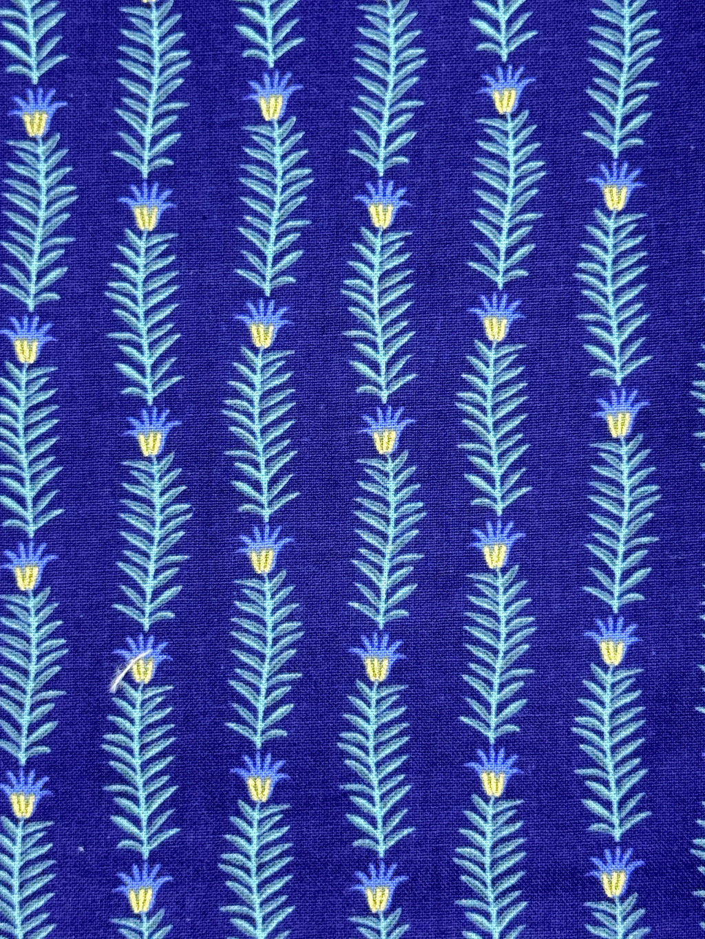 Navy blue and gold floral needlepoint finishing fabric