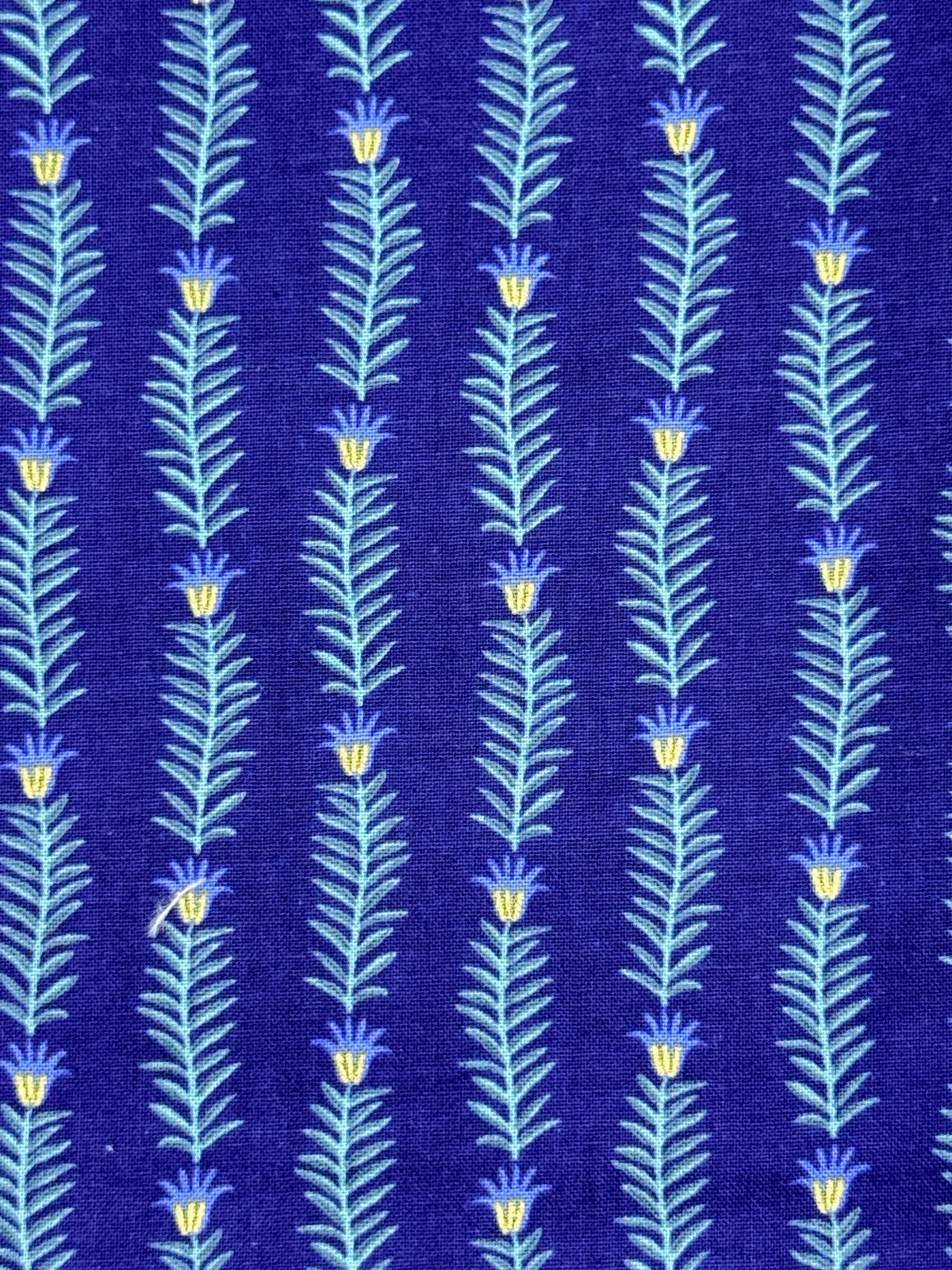 Navy blue and gold floral needlepoint finishing fabric