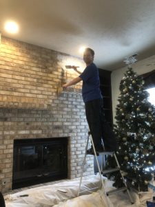 Before and after whitewashing a brick fireplace - Her Heartland Soul