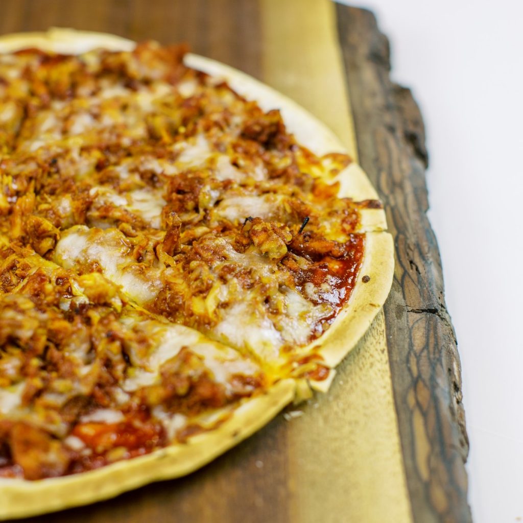 A BBQ Chicken Tortilla Pizza recipe that is perfect for summer entertaining. Made with Dorothy Lynch it's easy to make, quick to cook, and absolutely delicious.