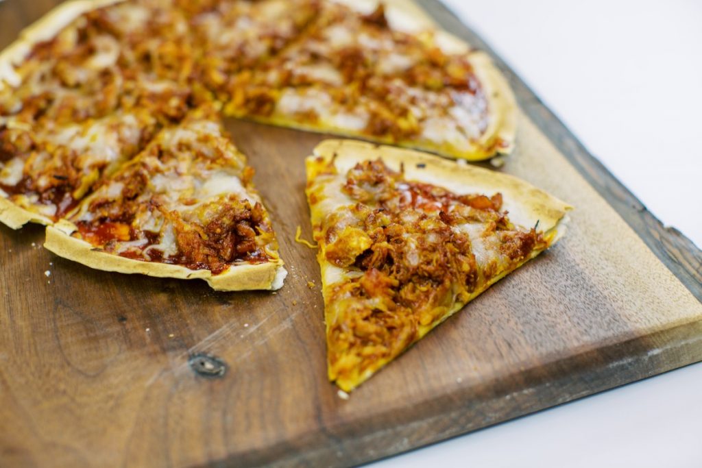 A BBQ Chicken Tortilla Pizza recipe that is perfect for summer entertaining. Made with Dorothy Lynch it's easy to make, quick to cook, and absolutely delicious.