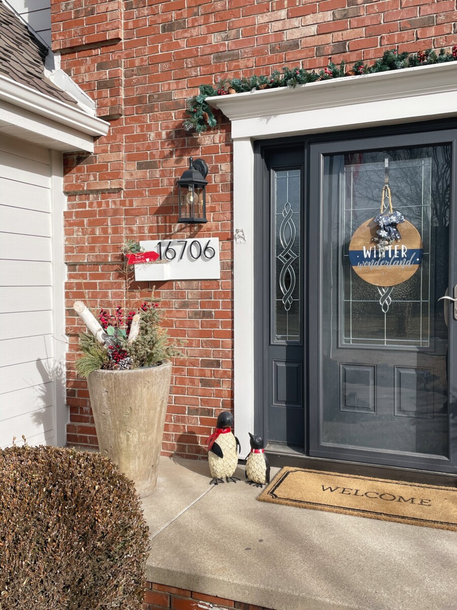 An inviting entryway featuring Entry Envy custom address sign