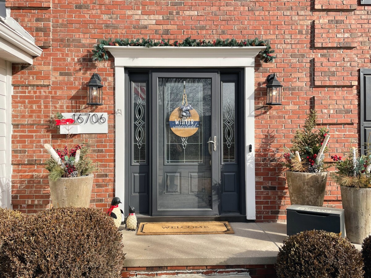 An inviting entryway featuring Entry Envy custom address sign - Her Heartland Soul