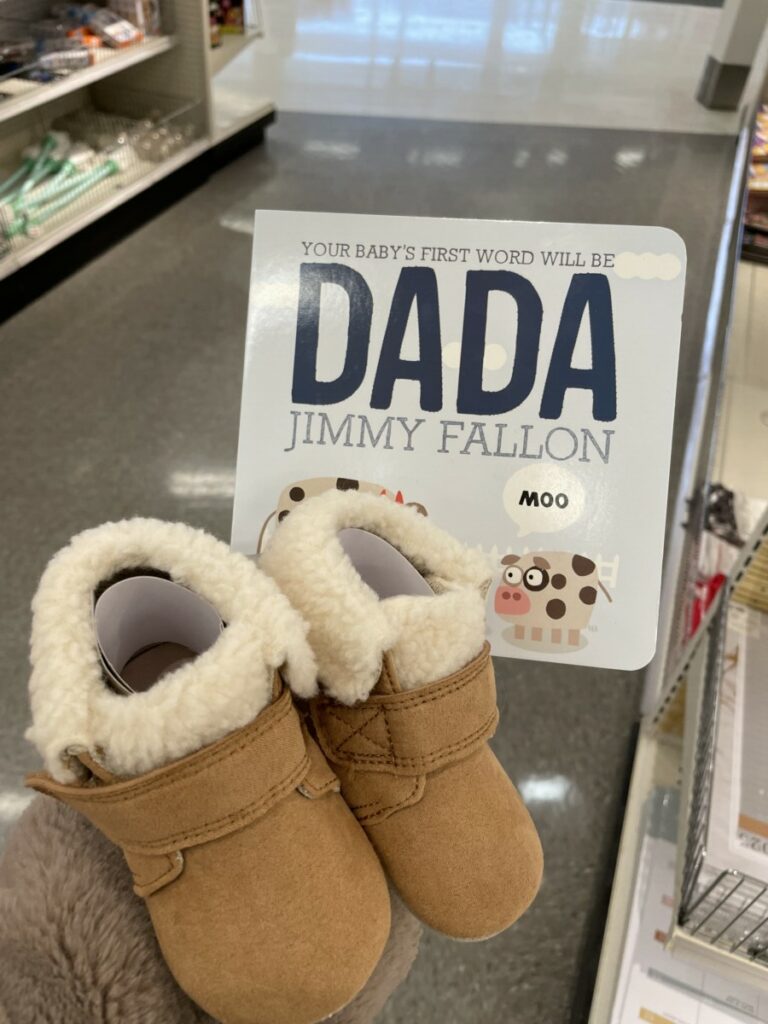 Dada book and baby booties at Target