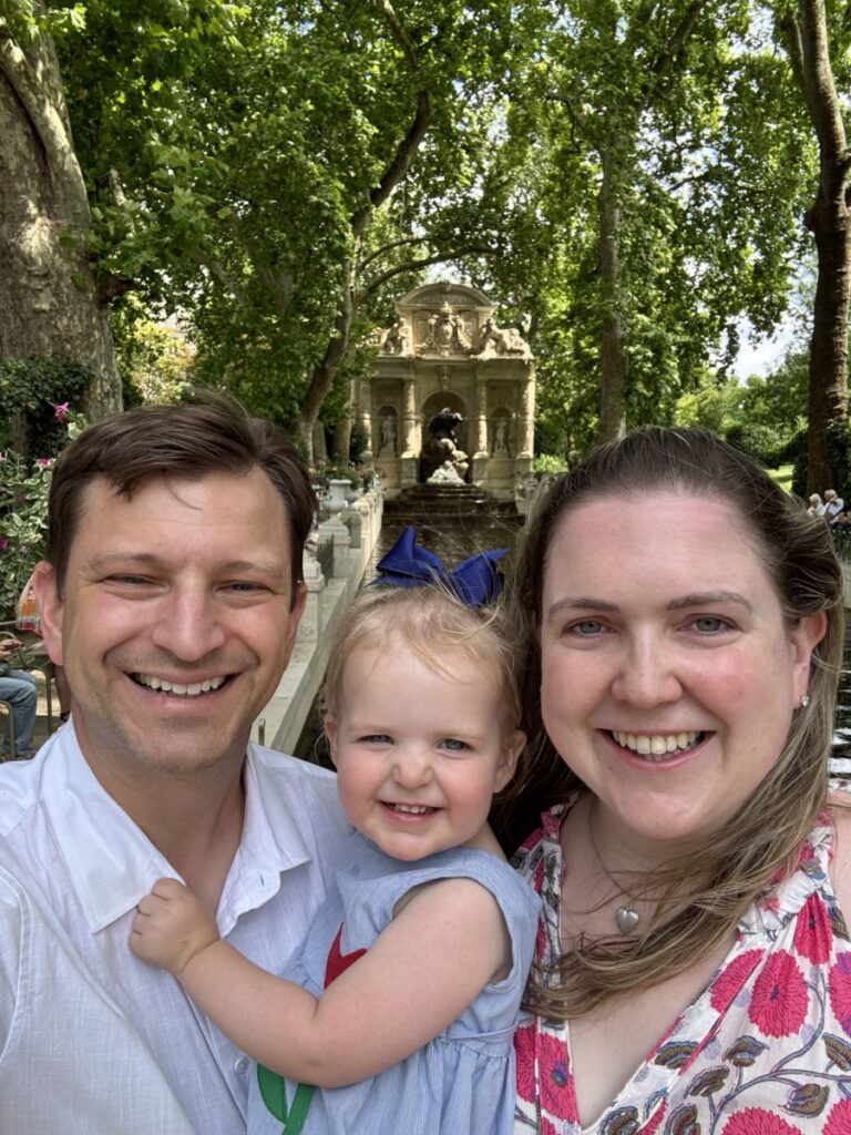 Family smiling in Paris