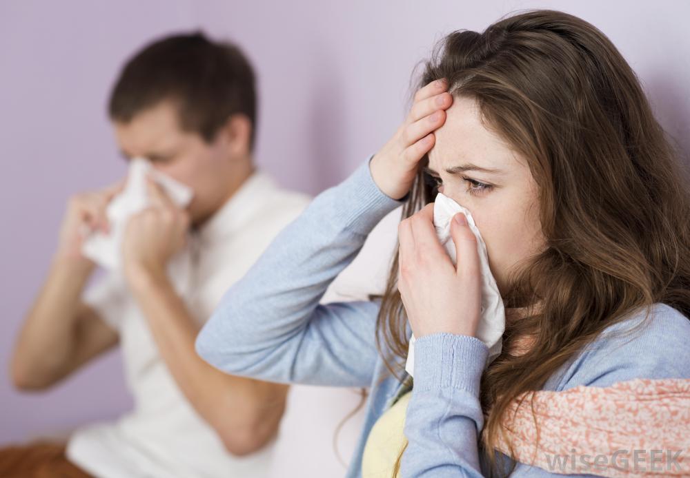 man-and-woman-sneezing